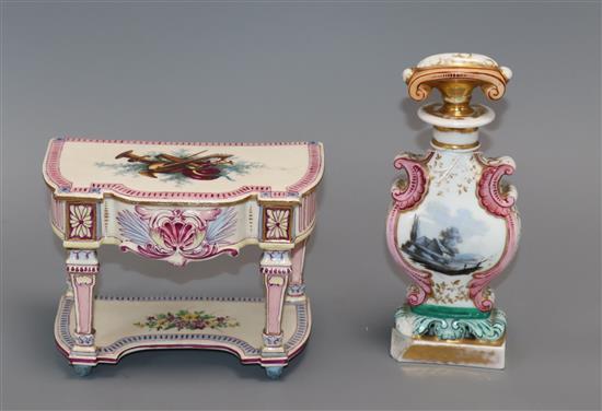 A porcelain scent bottle and faience table casket